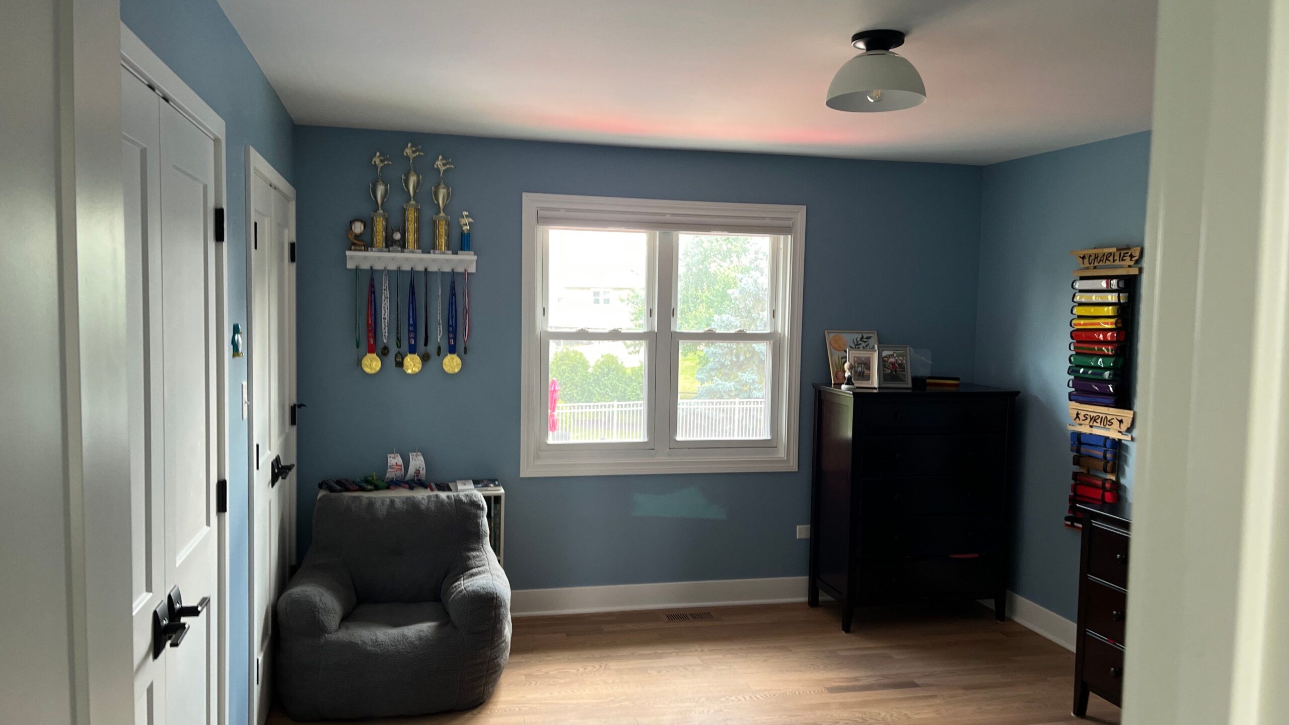 Professional painting project — Blue Bedroom Interior White Trim