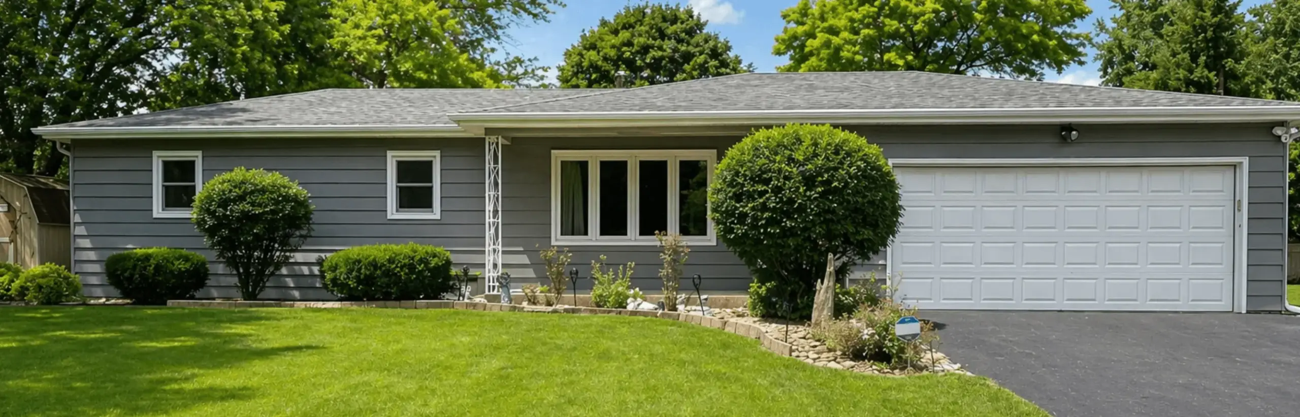 Inviting West Michigan-style home with a refined exterior palette