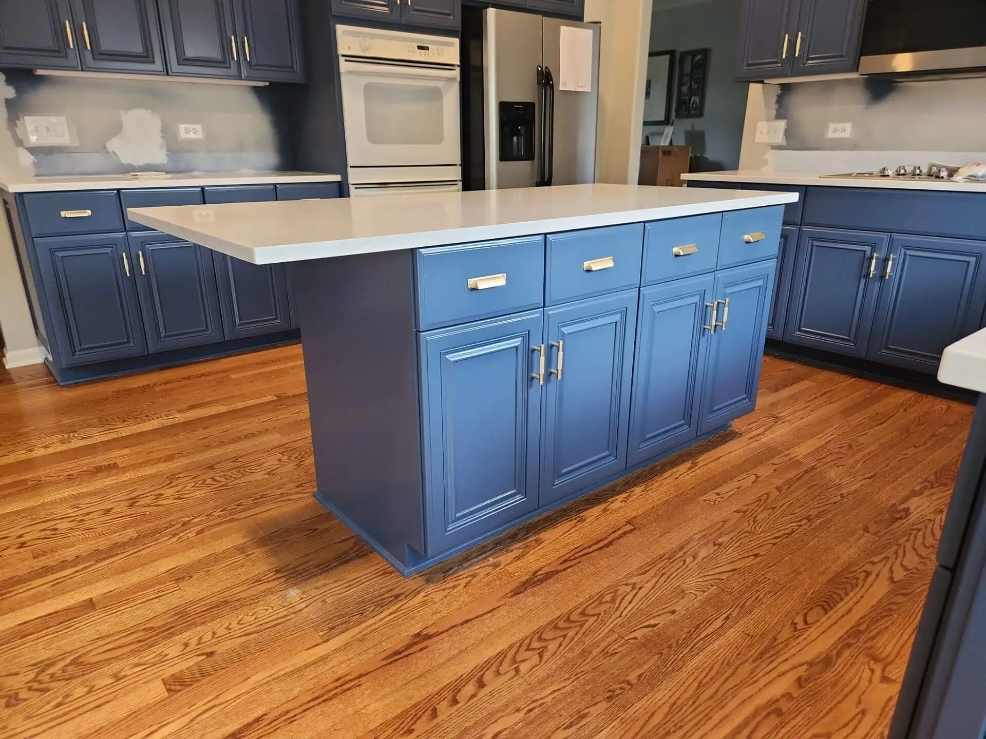 Kitchen with smooth painted cabinets and coordinated finishes