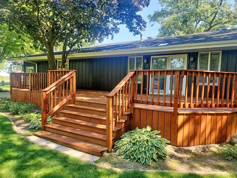 Professional painting project — Ranch Home Wood Deck