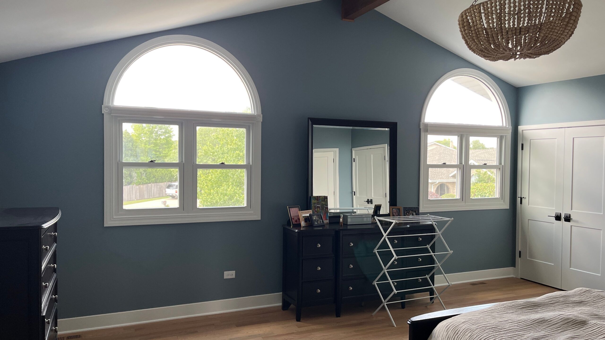 Bedroom with a smooth freshly painted ceiling and crisp trim