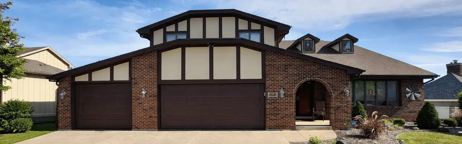 Professional painting project — Suburban Brick Stucco Home Exterior