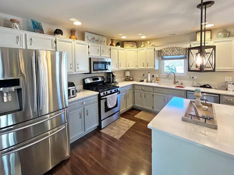 Professional painting project — Two Tone White Gray Kitchen Cabinets