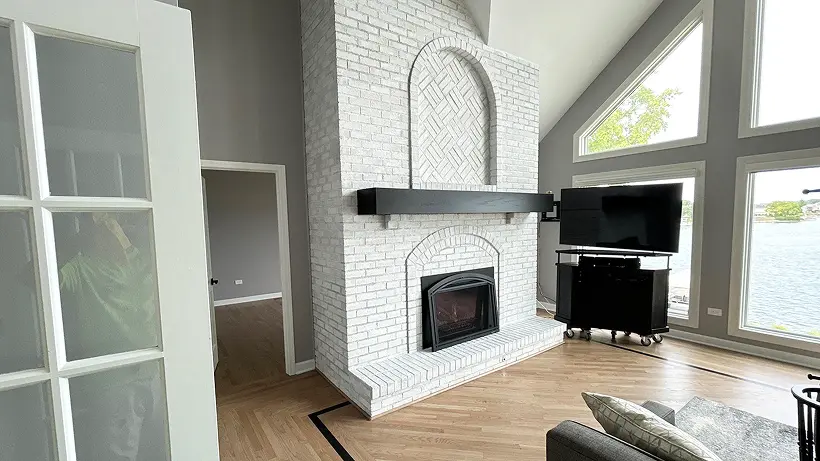 Professional painting project — White Brick Fireplace Grey Living Room